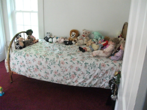 Bed with toys on it Chuck's Paranormal Adventures Investigation of the Sallie House -