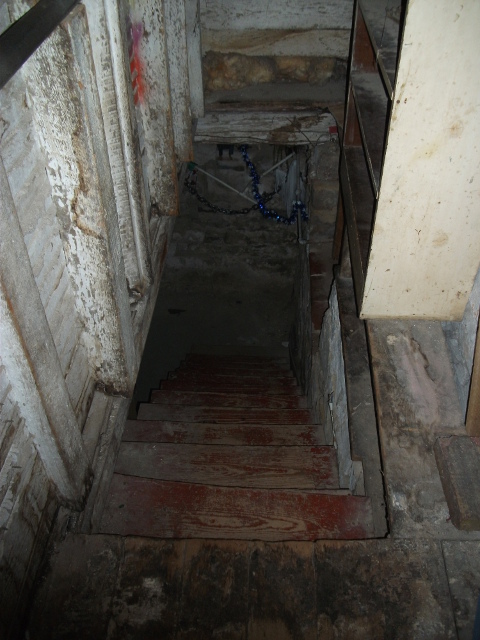 Staircase to the basement Chuck's Paranormal Adventures Investigation of the Sallie House -