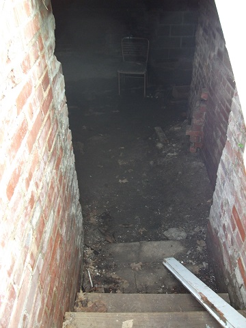 The entrance to the storm cellar outside the house. Chuck's Paranormal Adventures Investigation of the Villisca Ax Murder House -