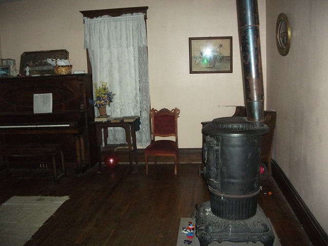 The living room where poltergeist activity scared away bikers. Chuck's Paranormal Adventures Investigation of the Villisca Ax Murder House -